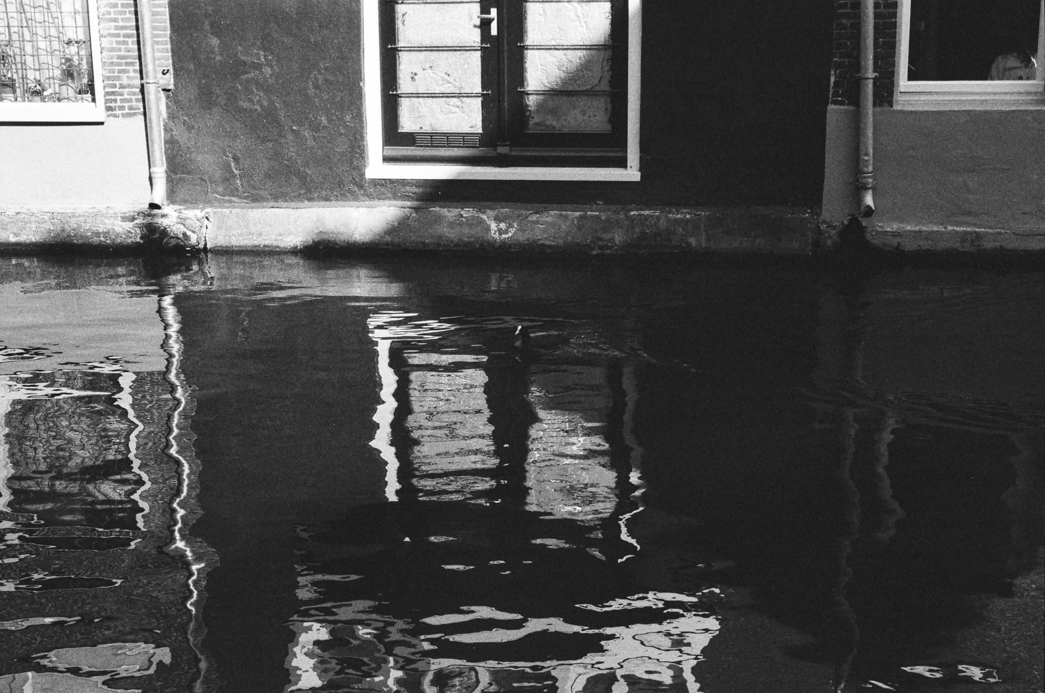 reflection photograph in amsterdam, shot on LEICA Q2